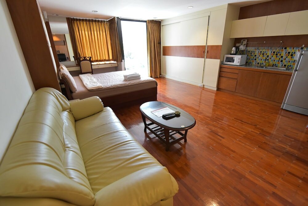 Фото Eight Ville Apartment