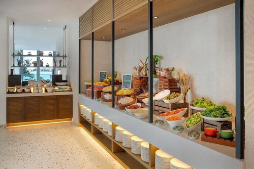 Гостиница Radisson Beach Resort Palm Jumeirah в Дубае