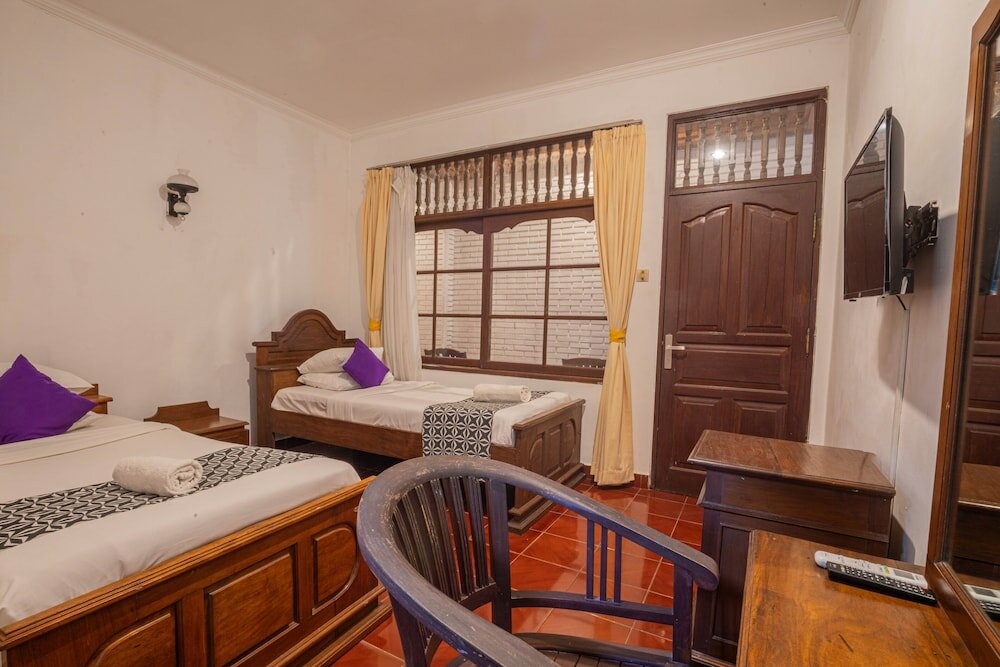 Фото Puri Mango Hotel