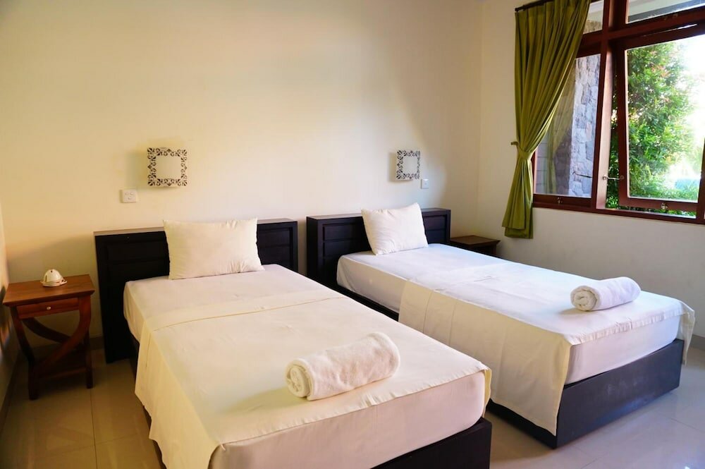 Фото Yulia 2 Homestay Sanur Guesthouse