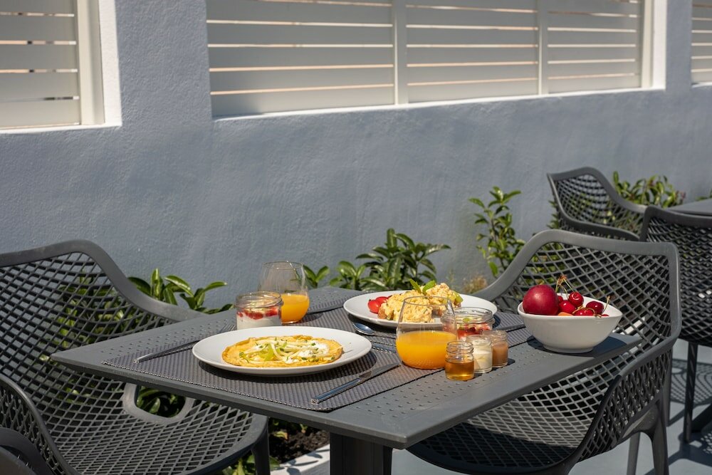 Фото Santoterra Antigua Suites