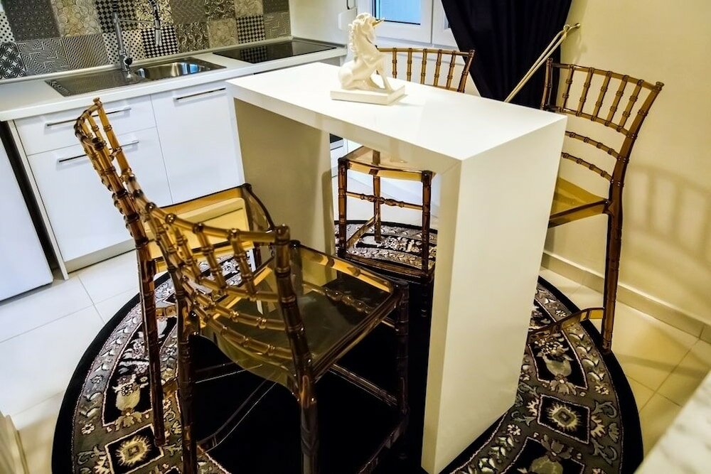 Фото Deluxe Apartments