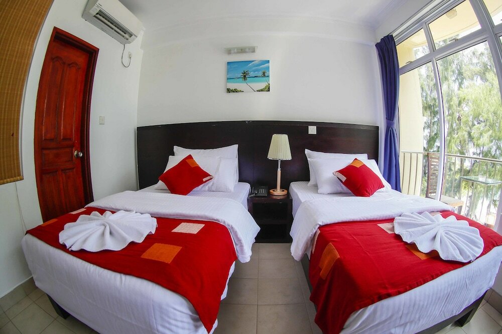 Фото Sunny Suites Inn