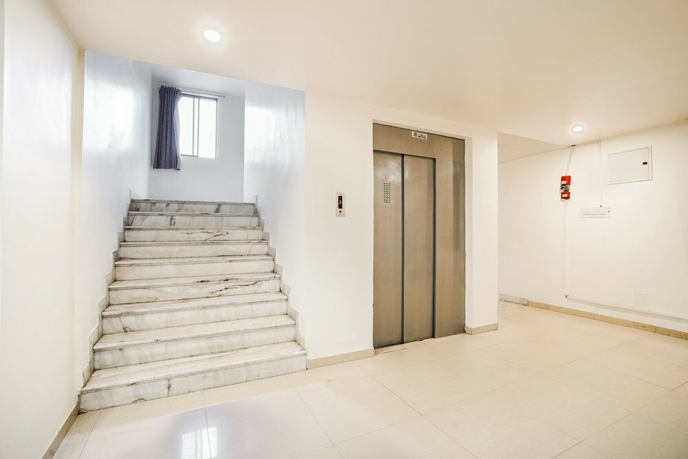 Фото Capital O 48482 Hotel Tribecca Inn