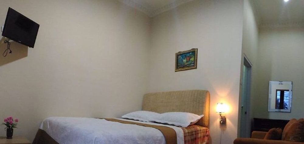 Фото Marry Ind Vila & Guest House Gunung Kawi Malang