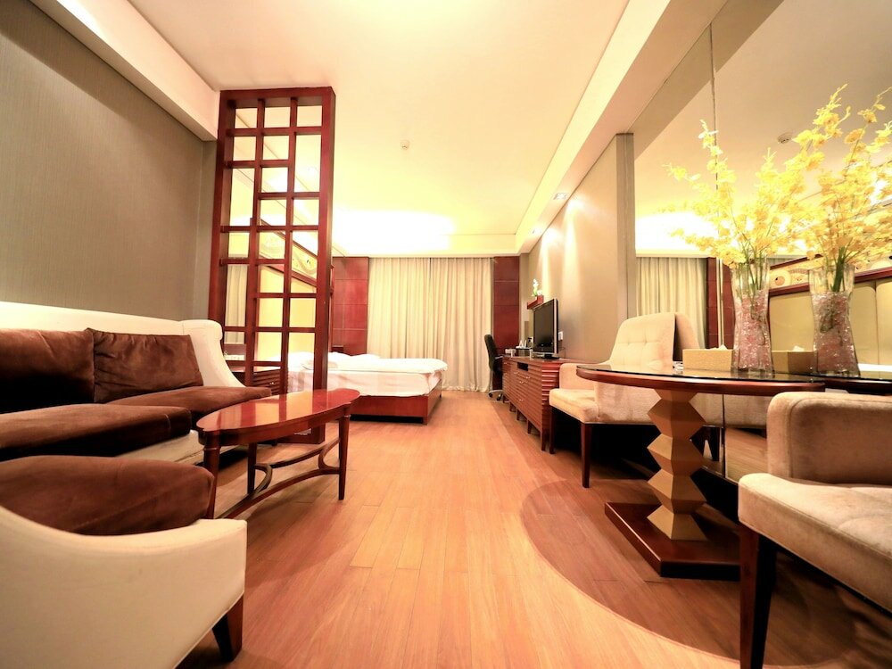 Фото Nanchang Honggutan Taili Apartment