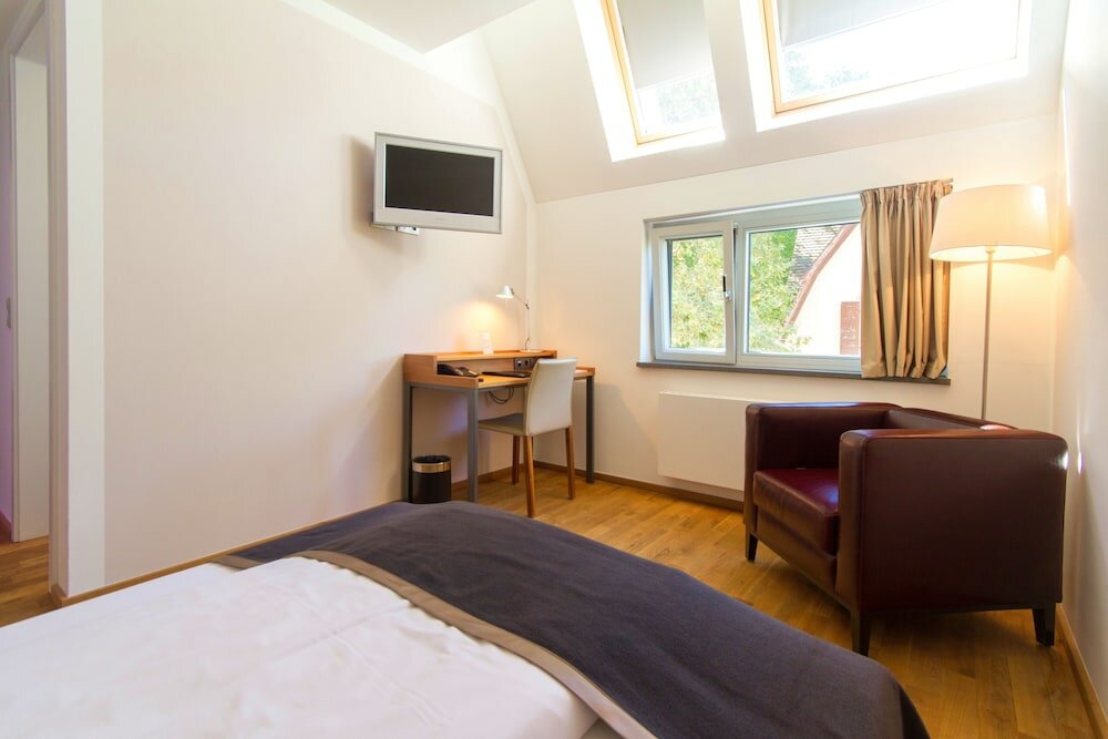 Фото Qube Hotel Bergheim