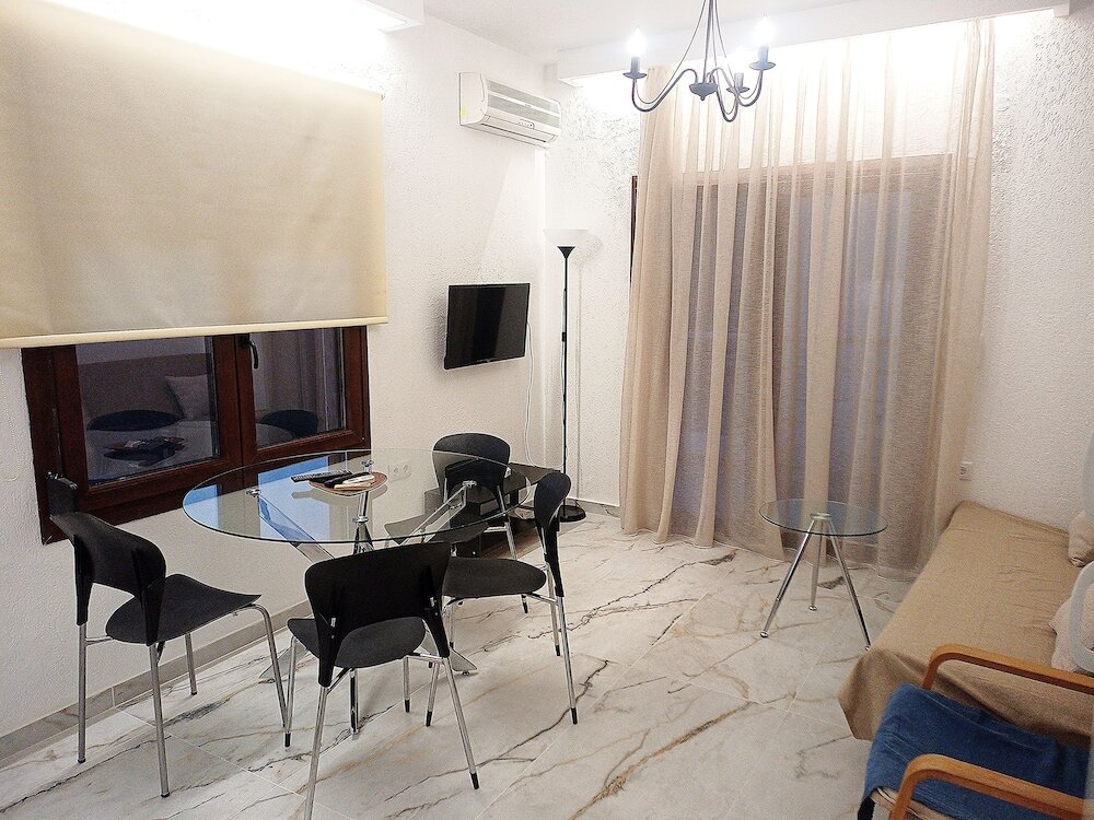 Фото Salonikiou Beach Deluxe Apartments