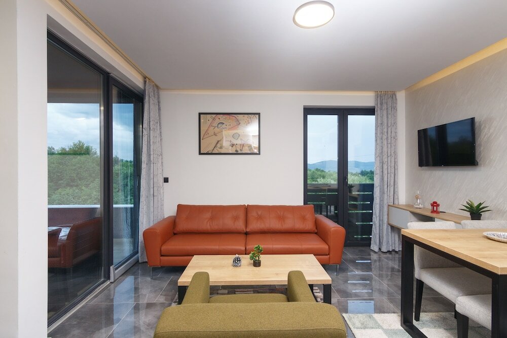 Фото Deluxe Feliciano Apartments