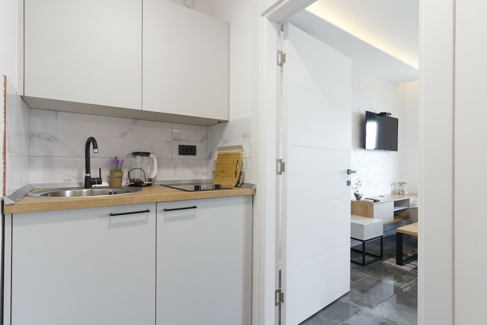 Фото Deluxe Feliciano Apartments