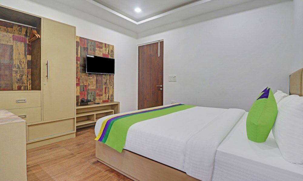 Фото Treebo Trend Kanopy Greens