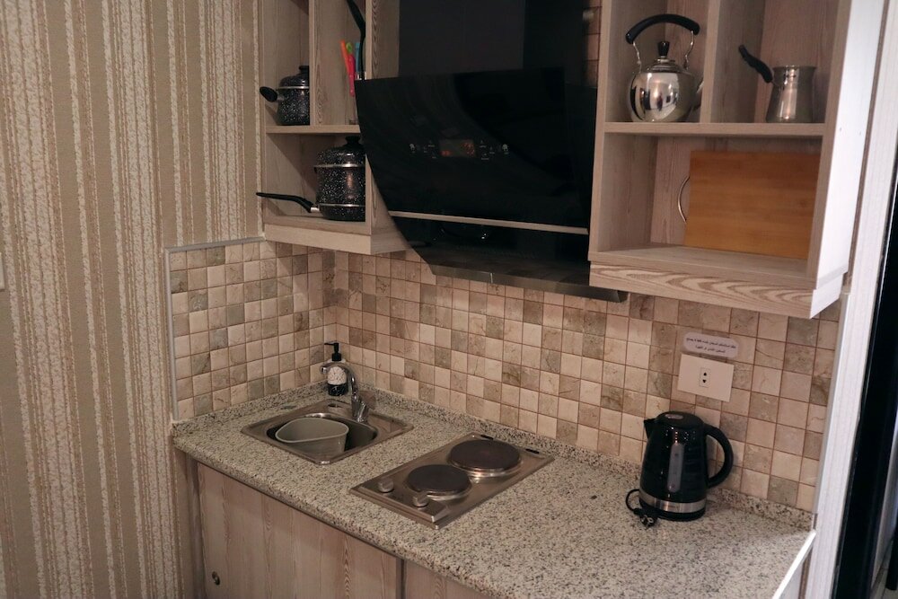 Фото Easy Inn Hotel Suites