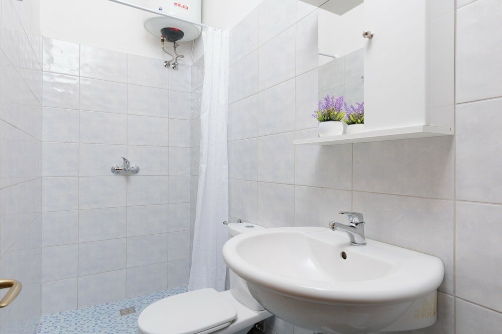 Фото The Island Life Apartments by Konnect, Ipsos Beach