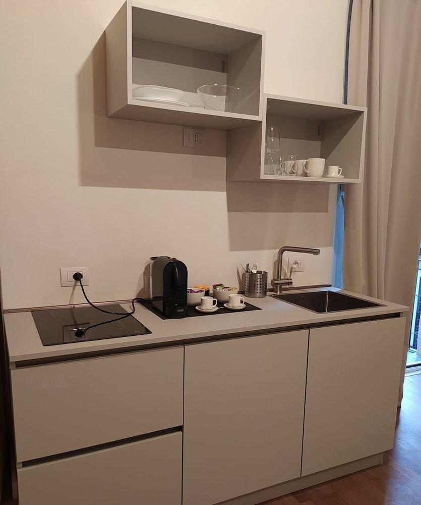 Фото Suite Vogue Piacenza