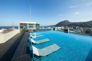 отель Отель Amanek Inn Beppu