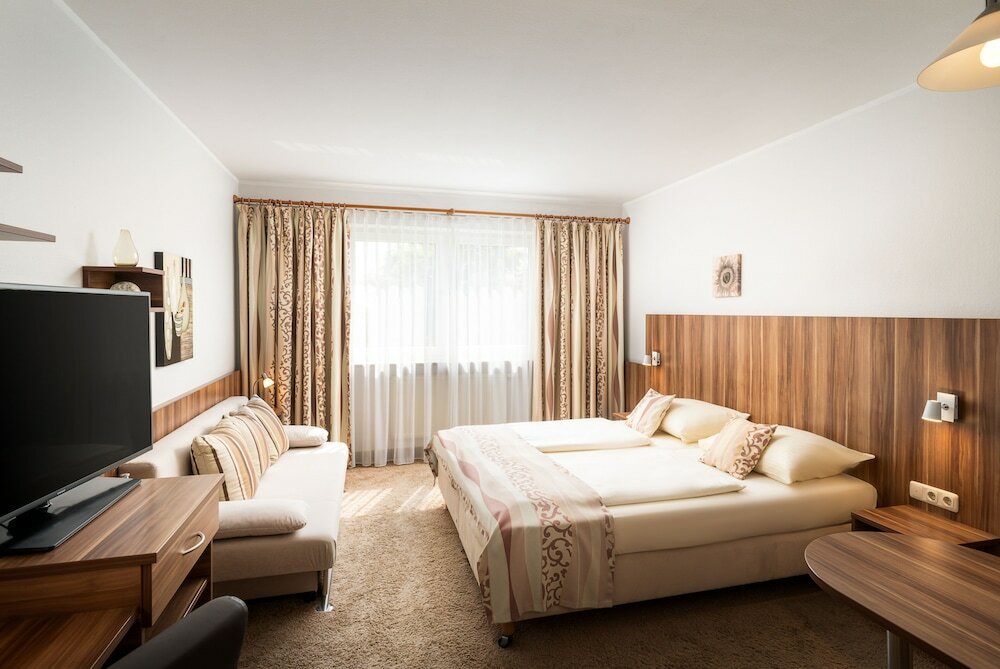 Фото Qu Hotel Augsburg