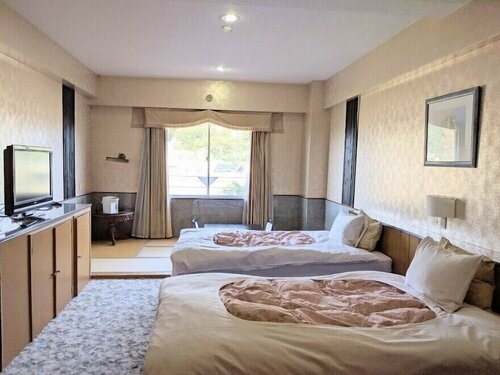 Гостиница Harazuru Onsen Hotel Topmega Itoen
