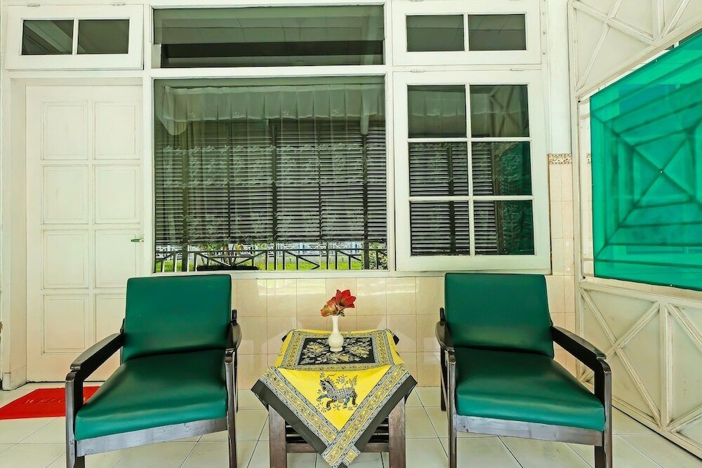 Фото Oyo 92454 Griya Raharja Guest House
