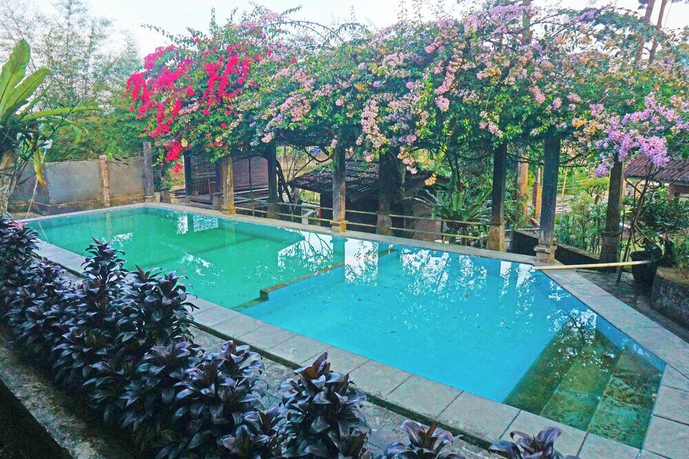 Фото Capital O 92836 Villa Kampoeng Katineung