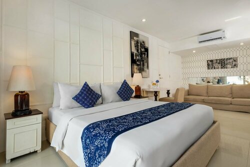 Гостиница The Kanjeng Suites Seminyak