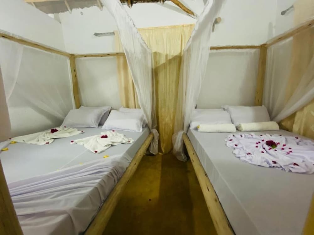 Фото Mkeka Spice Lodge