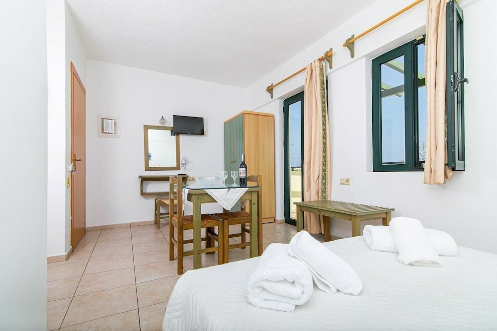 Фото Dionysos Apartments & Studios