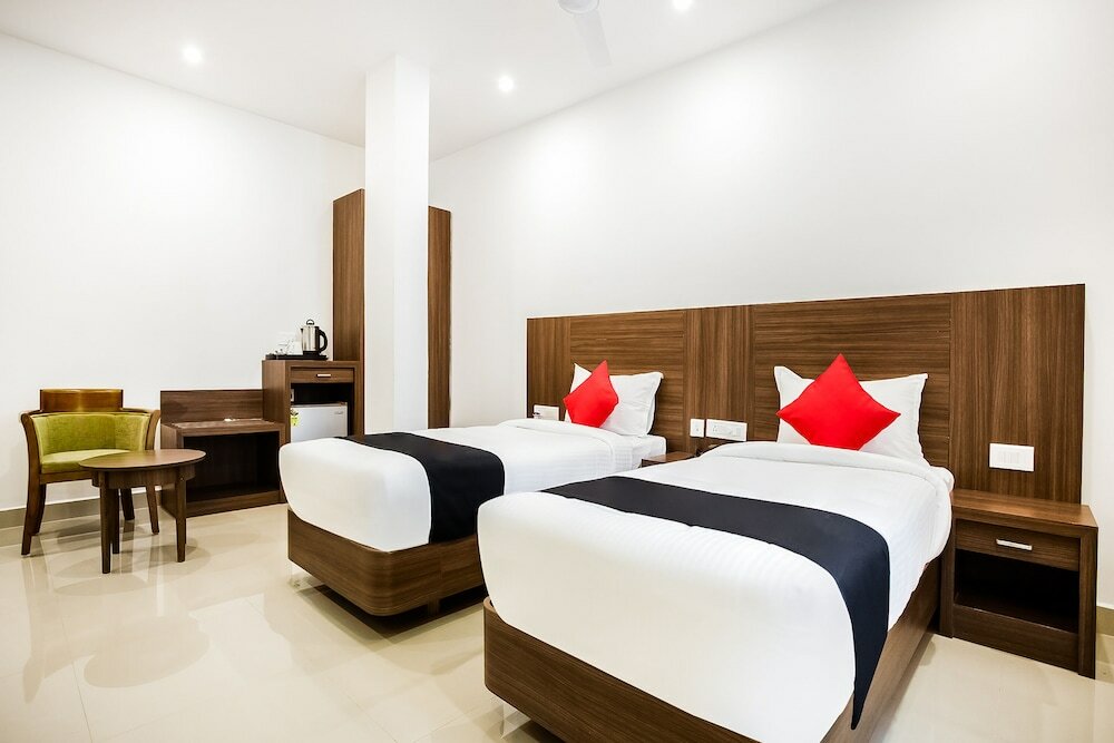 Фото Capital O 60558 Hotel Midhuna International