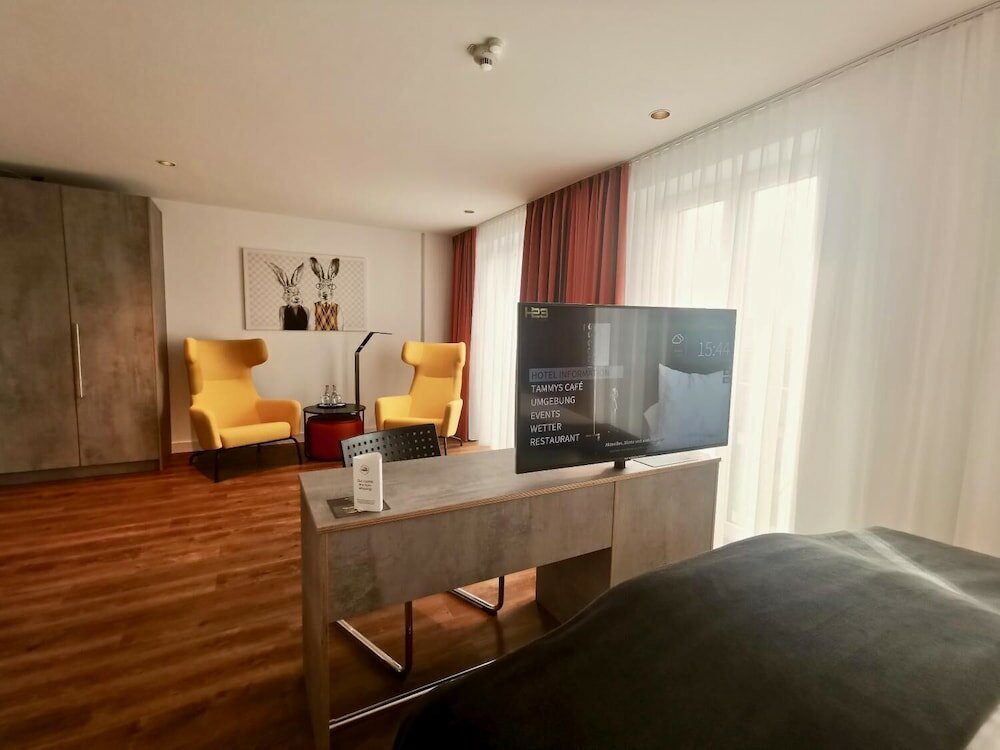 Фото H23 Boardinghotel