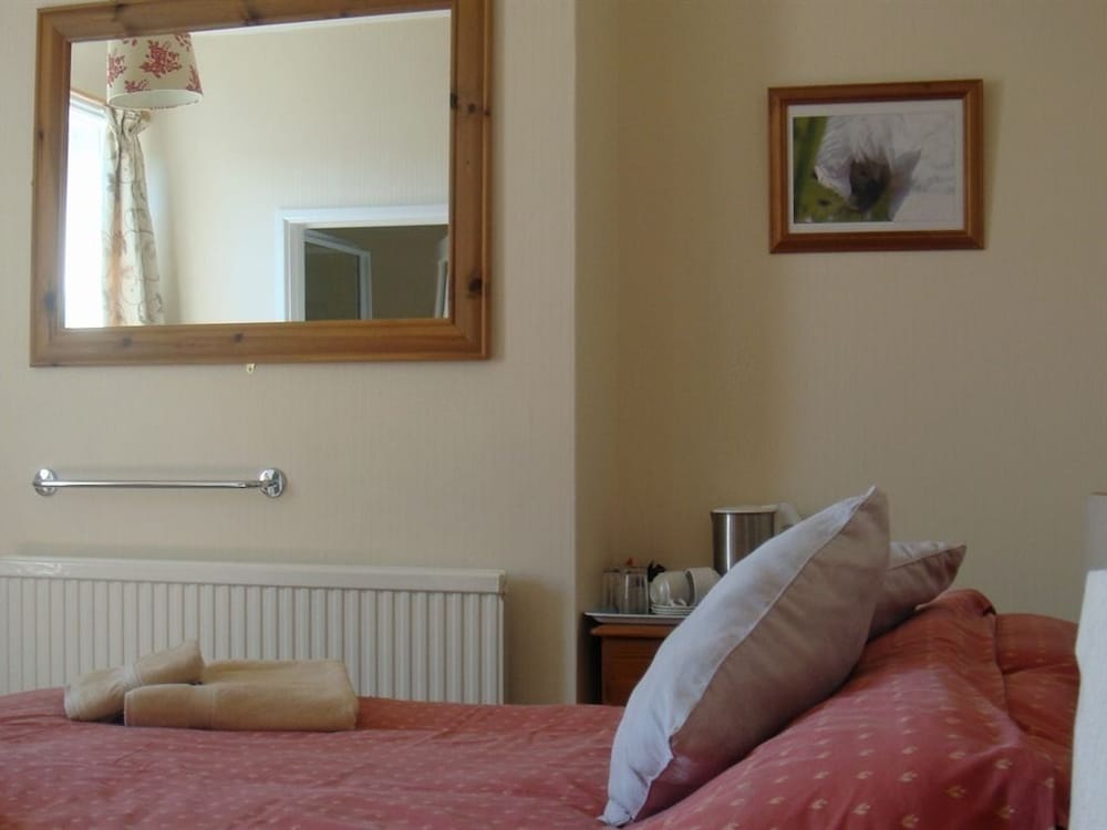 Фото Harlequin Guest House