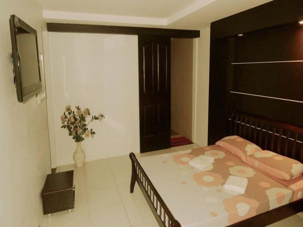 Фото Quezon Premier Hotel Lucena