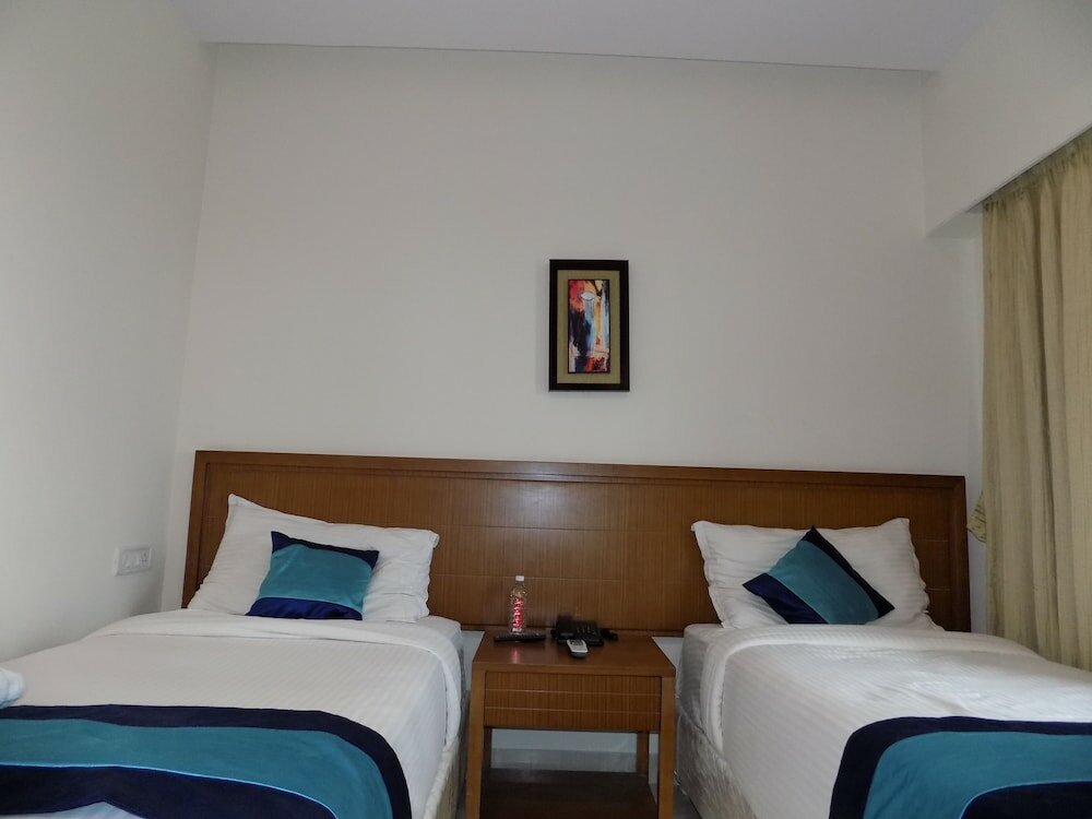 Фото Mint Magna Suites