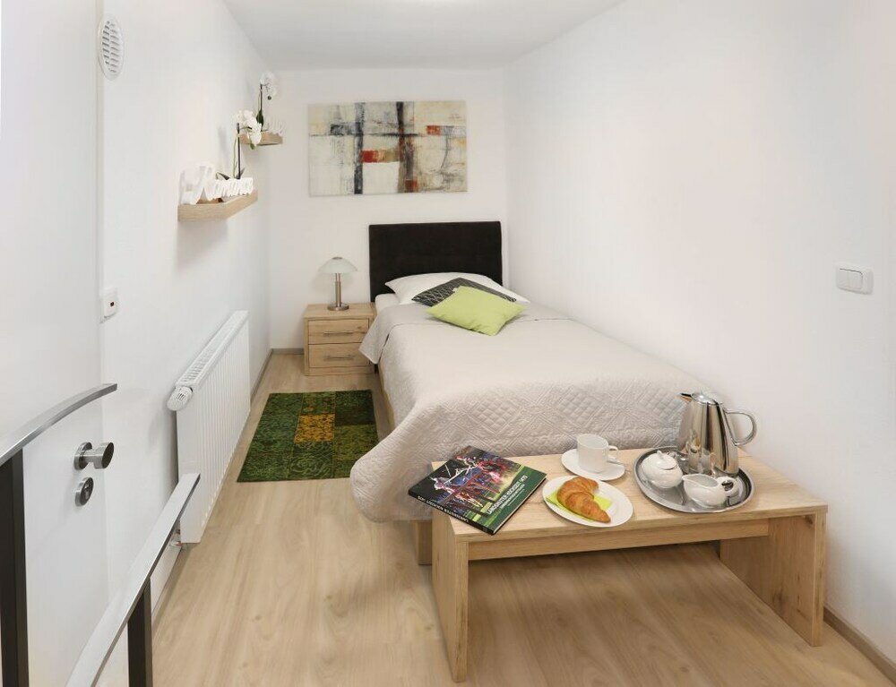 Фото Ferienwohnung am Regierungsplatz