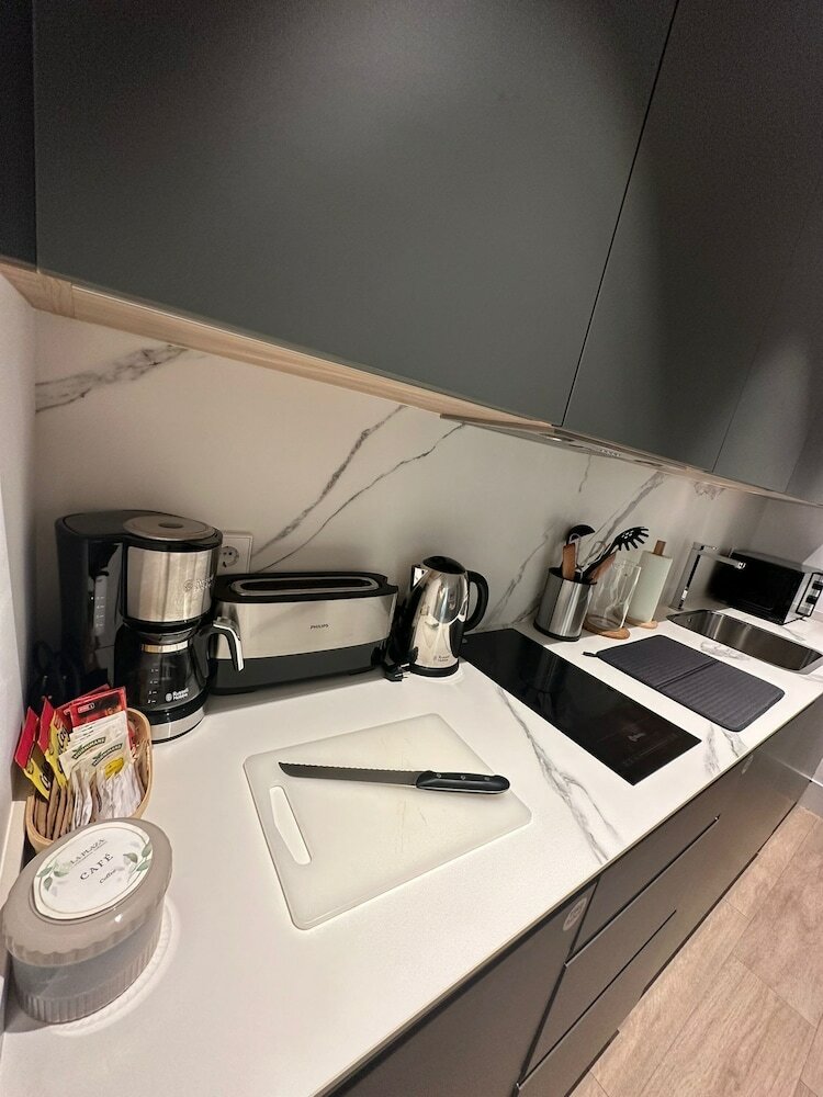 Фото Apartamentos Turísticos La Plaza