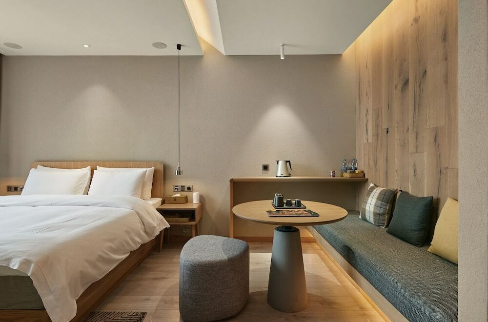 Фото Ebo Hotel Hangzhou Wulinmen