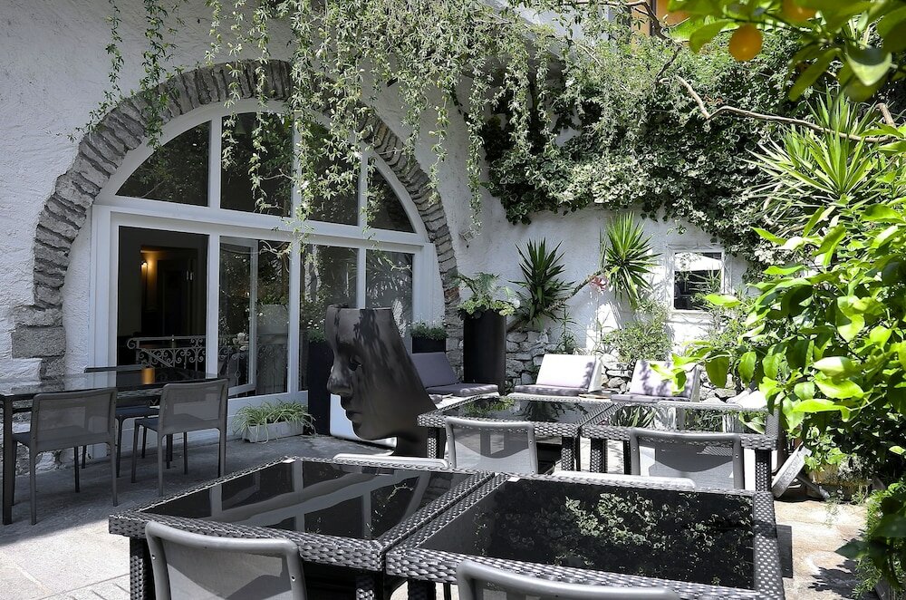 Фото Caffè dell'Arte Boutique Rooms