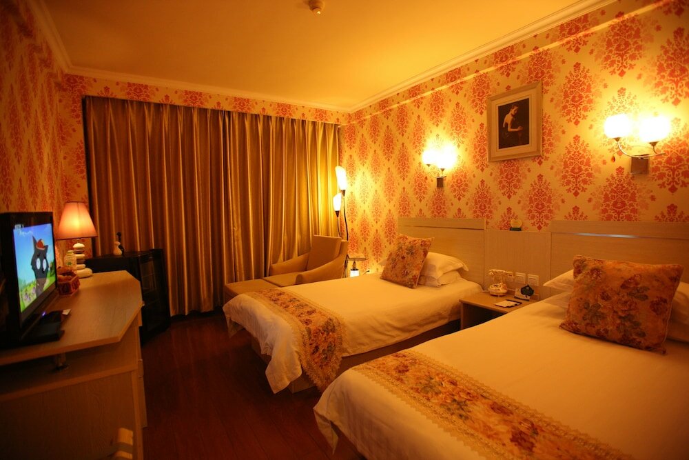 Фото Overseas Chinese International Hotel