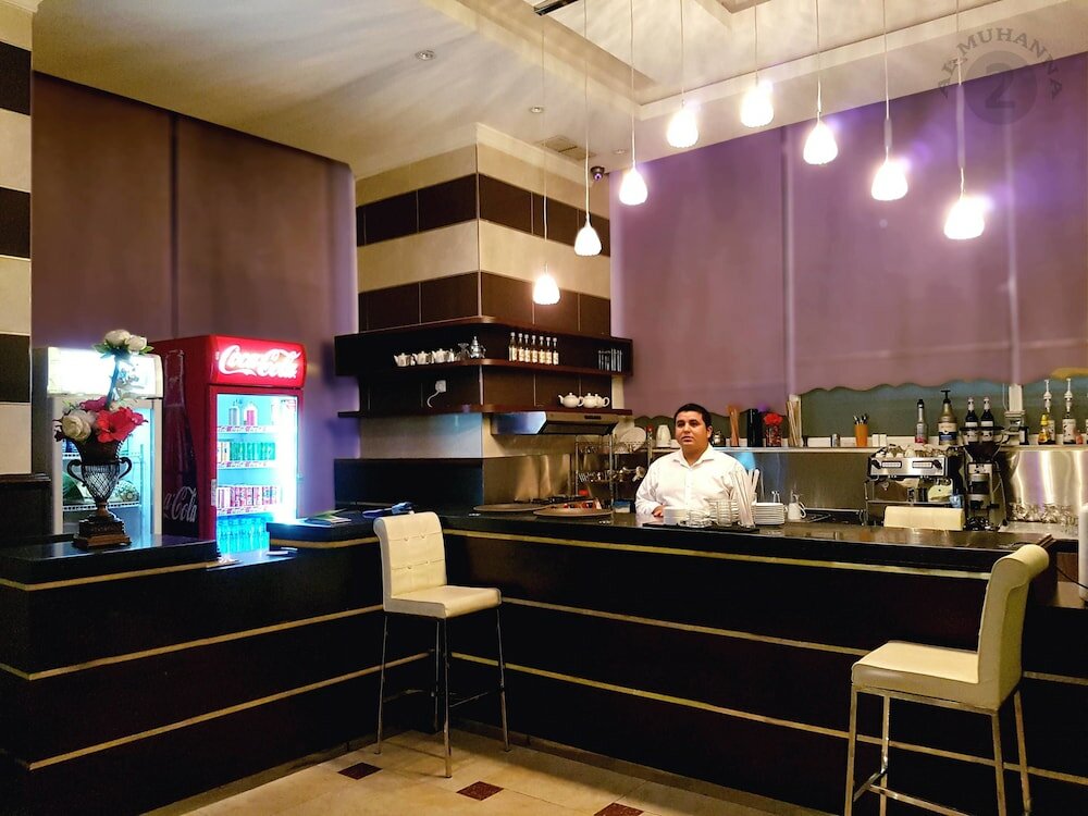 Фото Al Muhanna Plaza Hotel