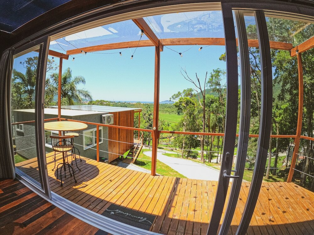 Фото Casa de Vidro - Hospedar com Propósito