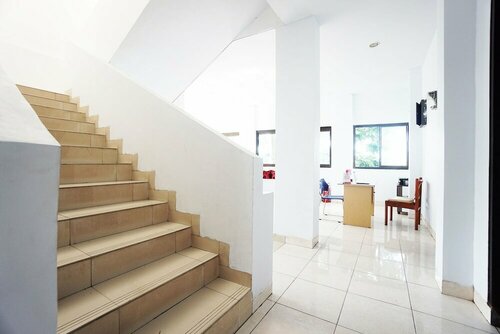 Гостиница Oyo 2566 Putri Kesia Rooms в Манадо