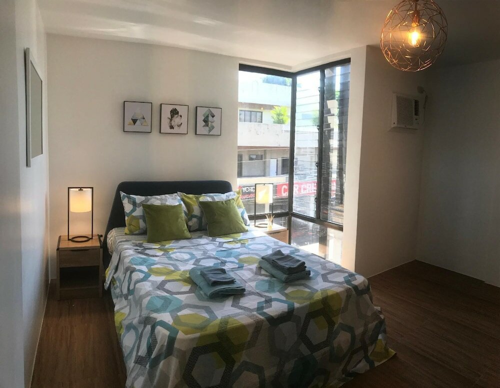 Фото Unwnd Residences Dumaguete