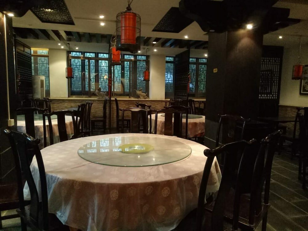 Фото Qiao Garden Vacation Hotel