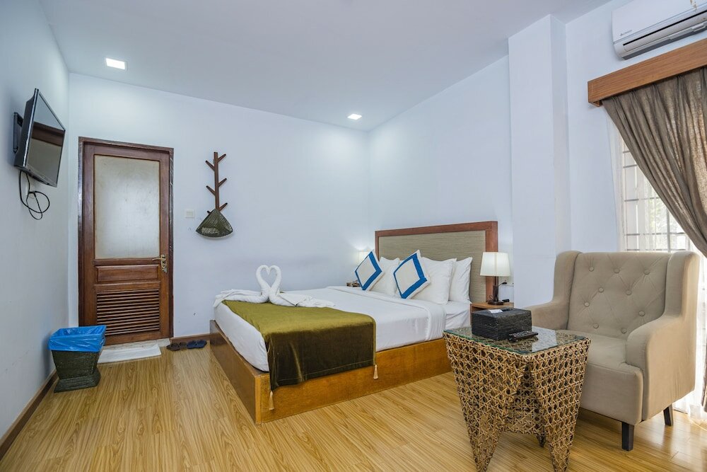 Фото Agga@9mile Hotel