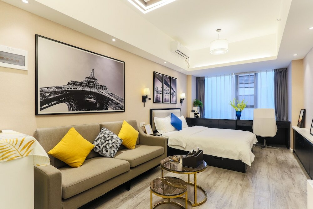 Фото Yue Qi Hotel Apartment