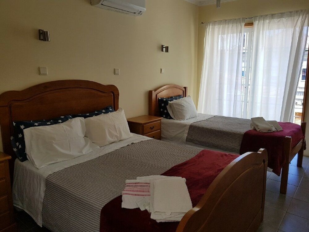 Фото Pensão Leão De Ouro