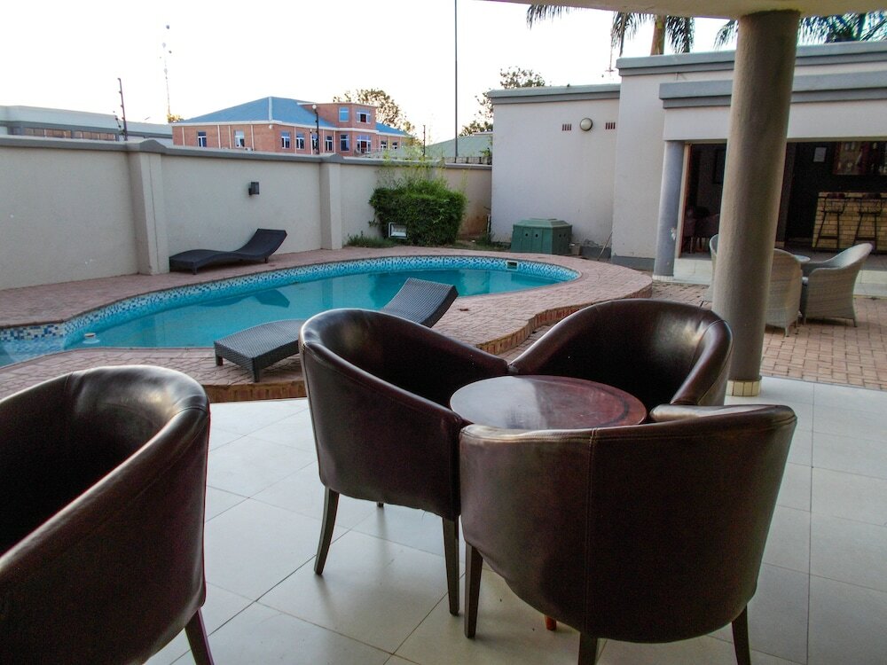 Фото Four Pillars Lodge