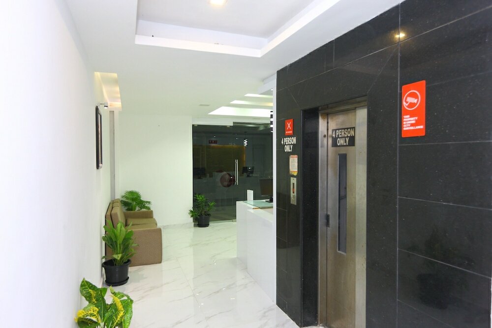 Фото Oyo 9372 Rich Inn