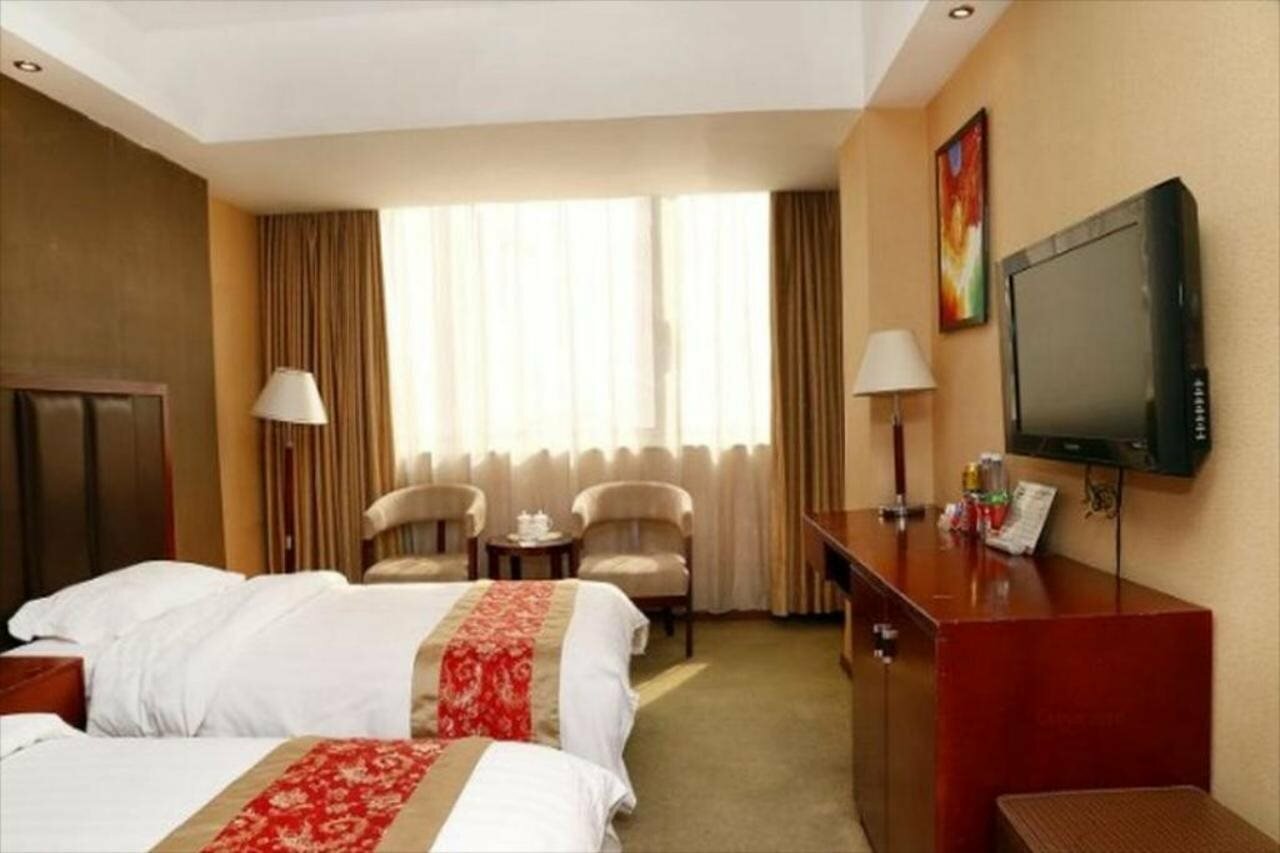 Фото Xinghua Hotel