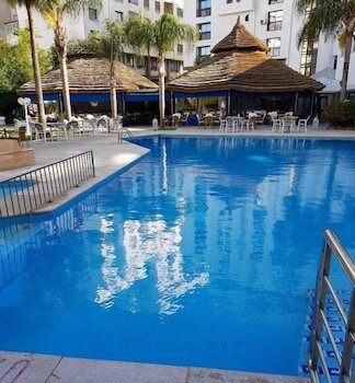 Фото El Oumnia Puerto & SPA