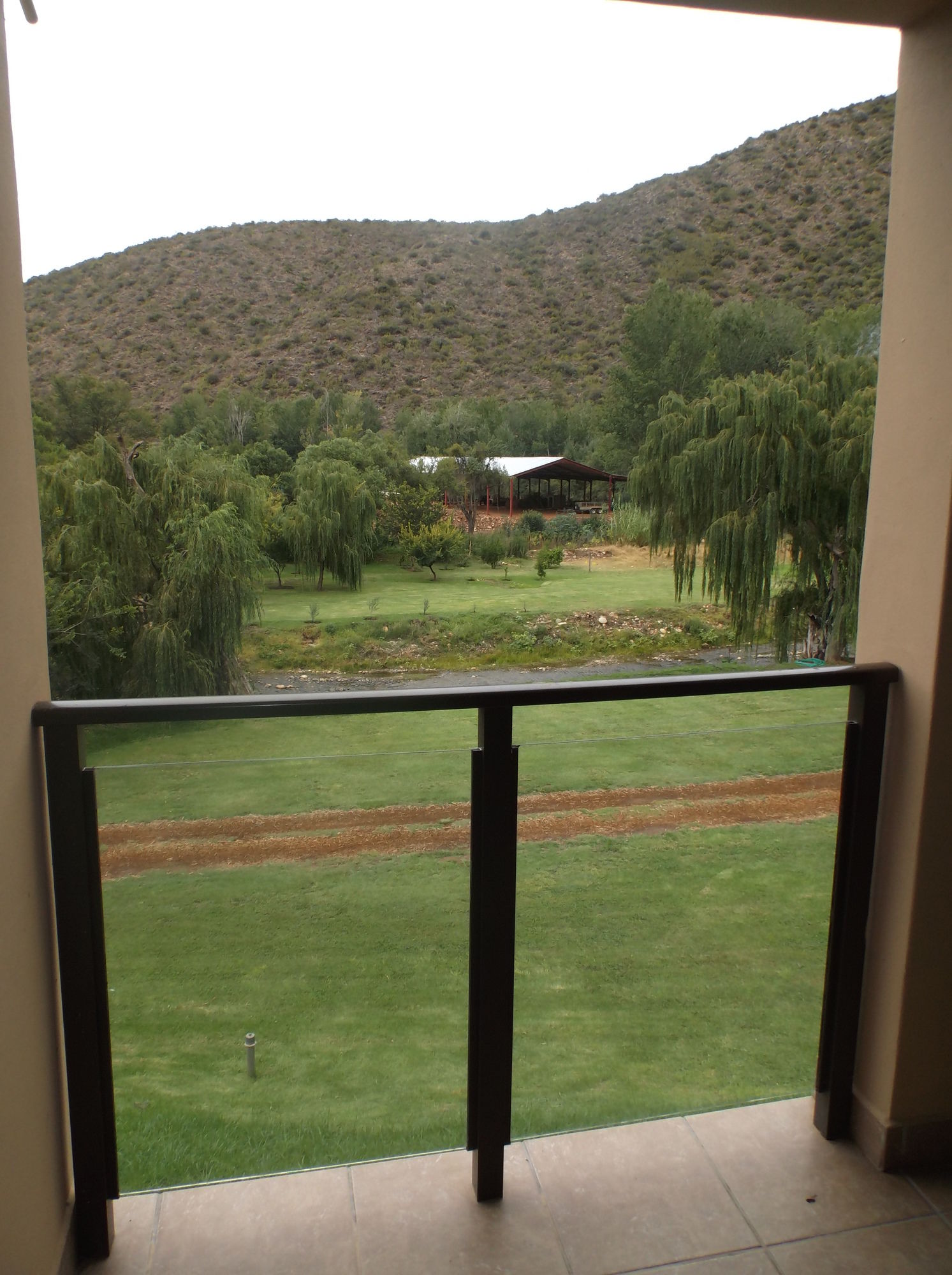 Фото Old Mill Lodge, Working Ostrich Farm & Restaurant, Oudtshoorn