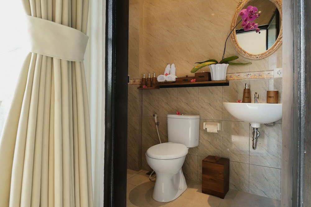 Фото Tigata Ubud Cottage